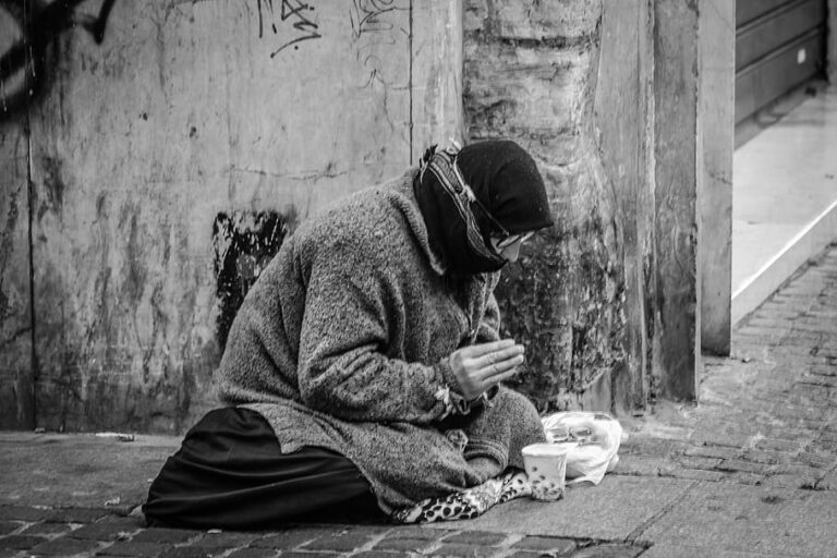 adult-begging-black-and-white-daylight